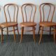 Suite de 5 chaises bistrot caramel cannées années 70