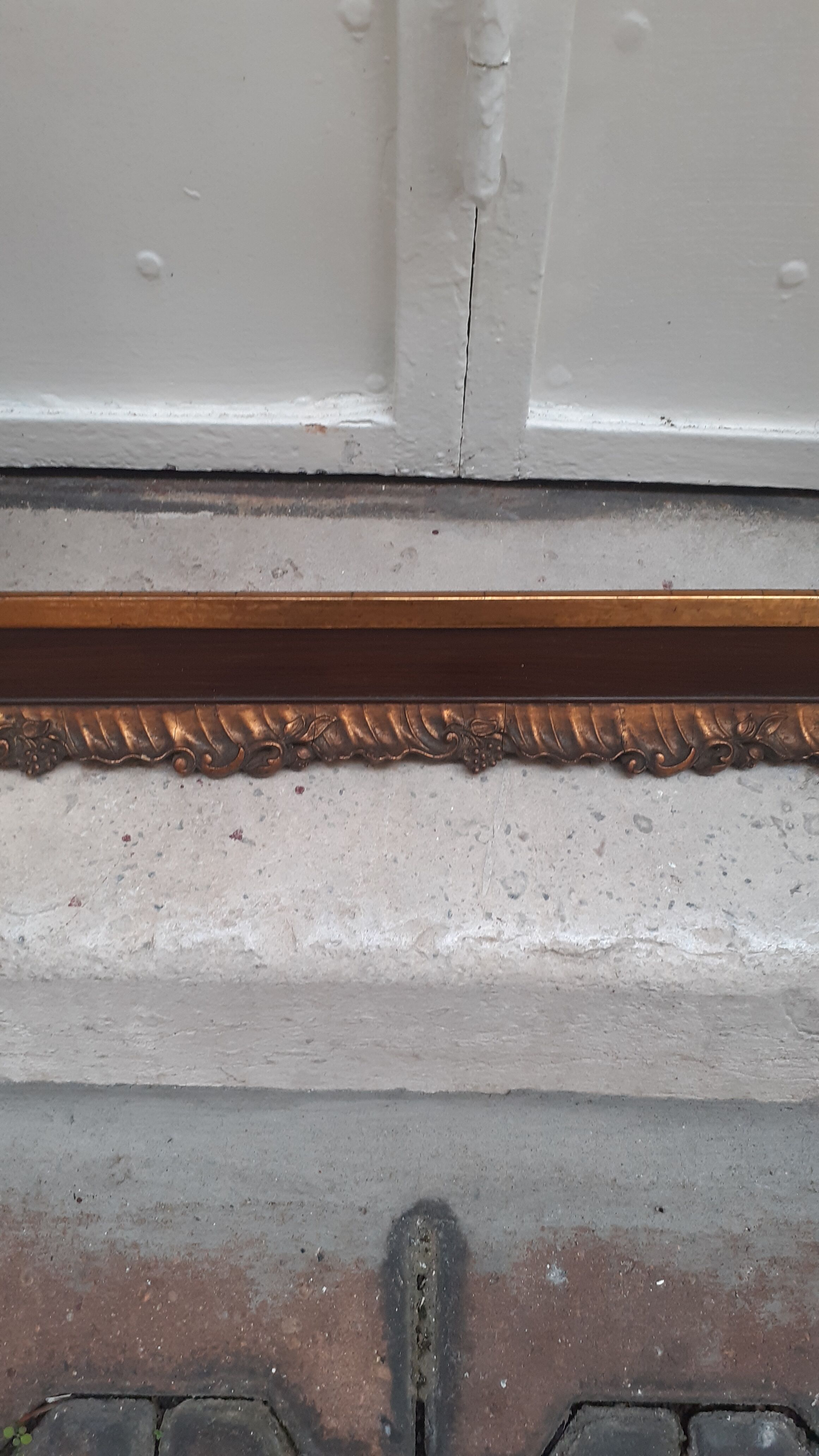 Carved frame with gilding