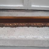 Carved frame with gilding