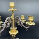 Candelabra with cherub in patinated bronze
