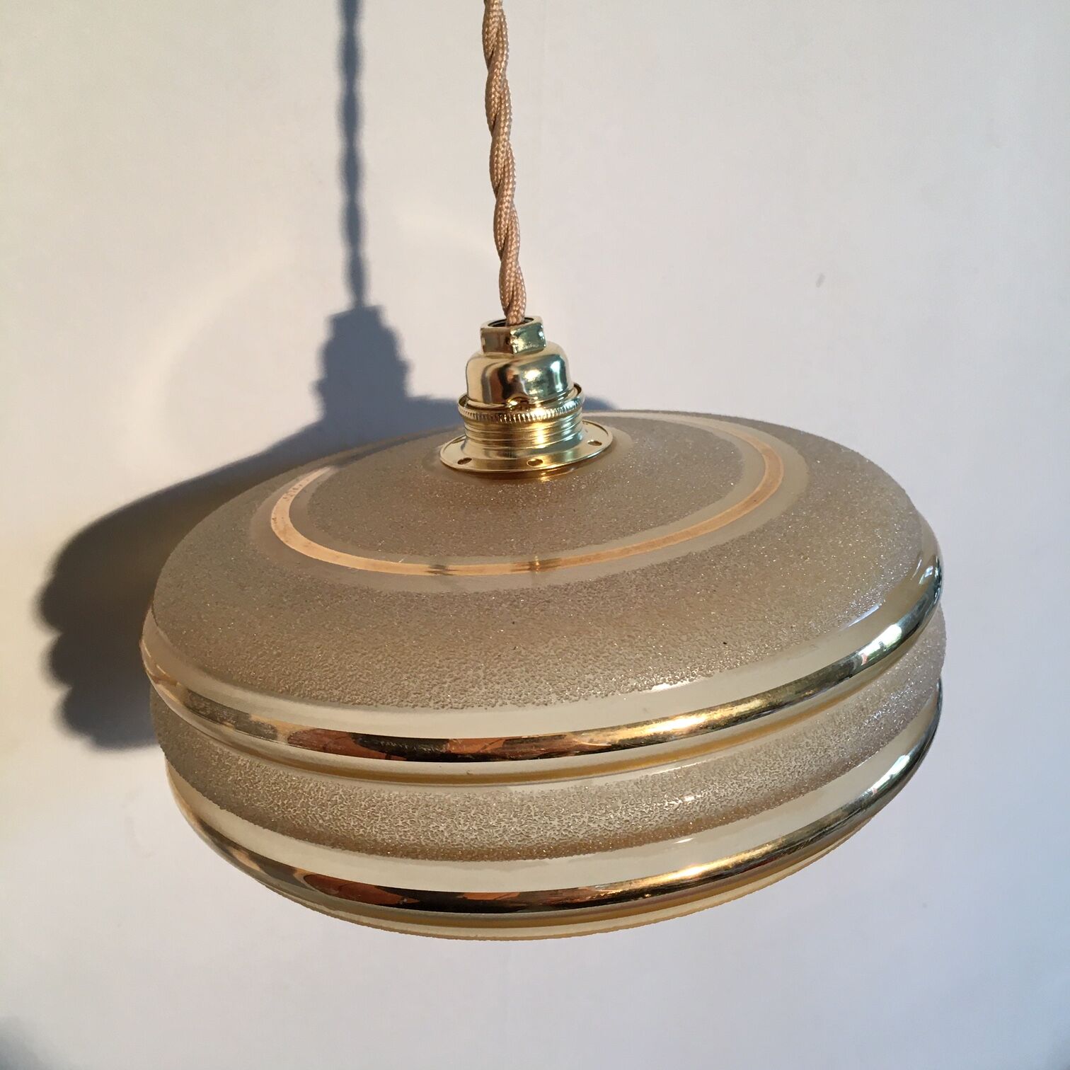 Hanging in yellow granite glass and golden edar