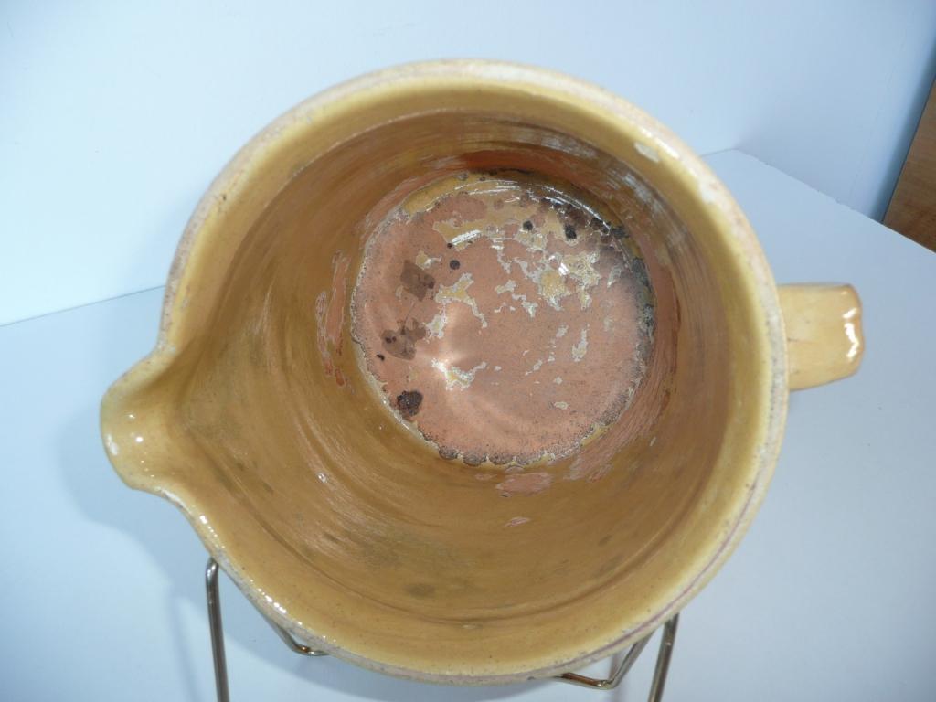 Glazed earth pitcher