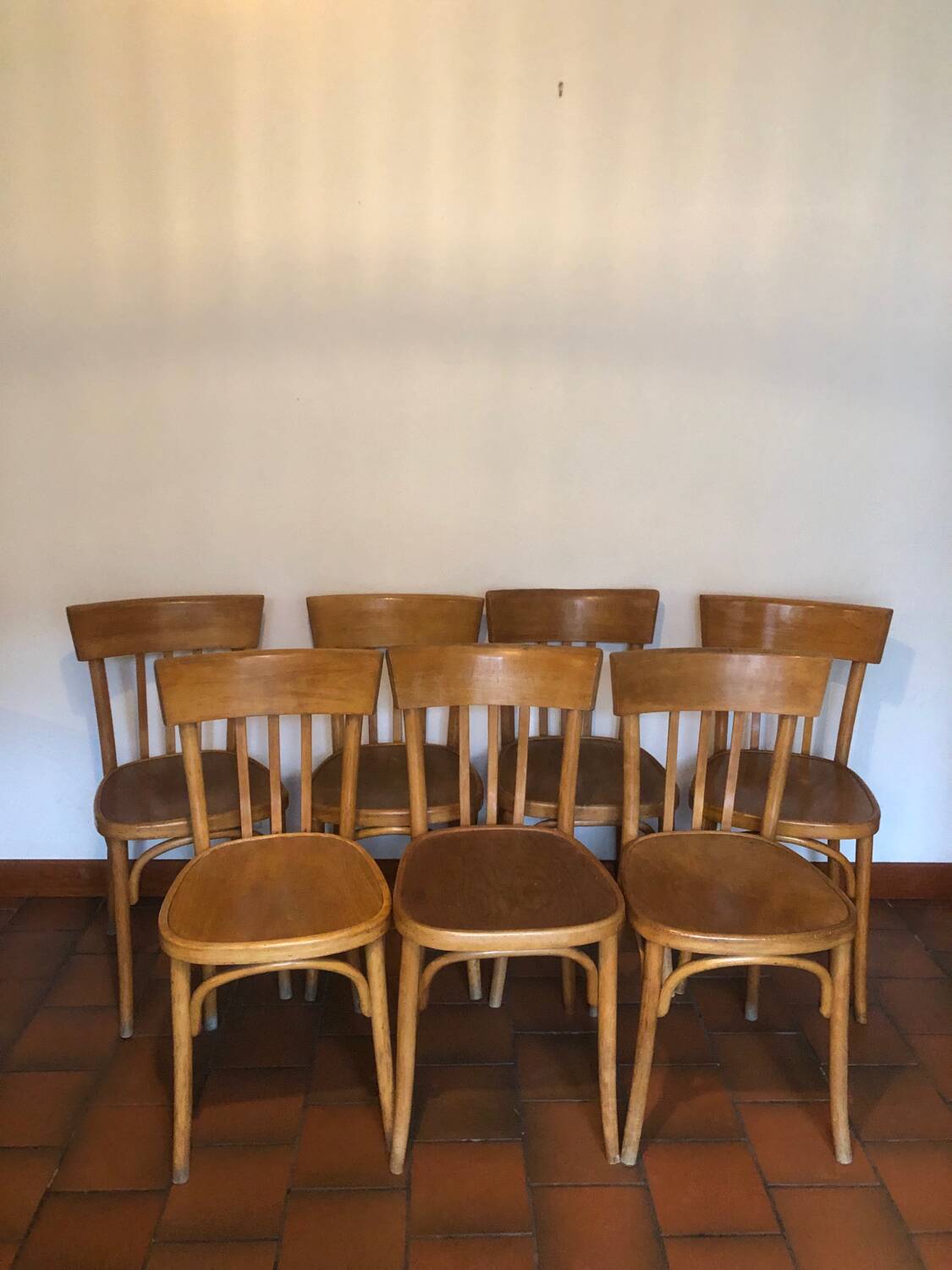 Suite de 7 chaises bistrot, editeur baumann - années 60