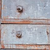 Antique piece of furniture with a grey patina.