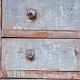 Antique piece of furniture with a grey patina.