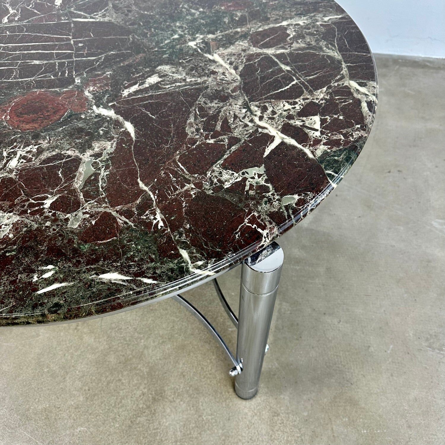 Coffee table with marble top and chrome base