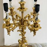 Pair of gilded bronze candlesticks, marble bases.