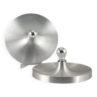 Pair of round brushed aluminum wall lights. Ufo model, 1960