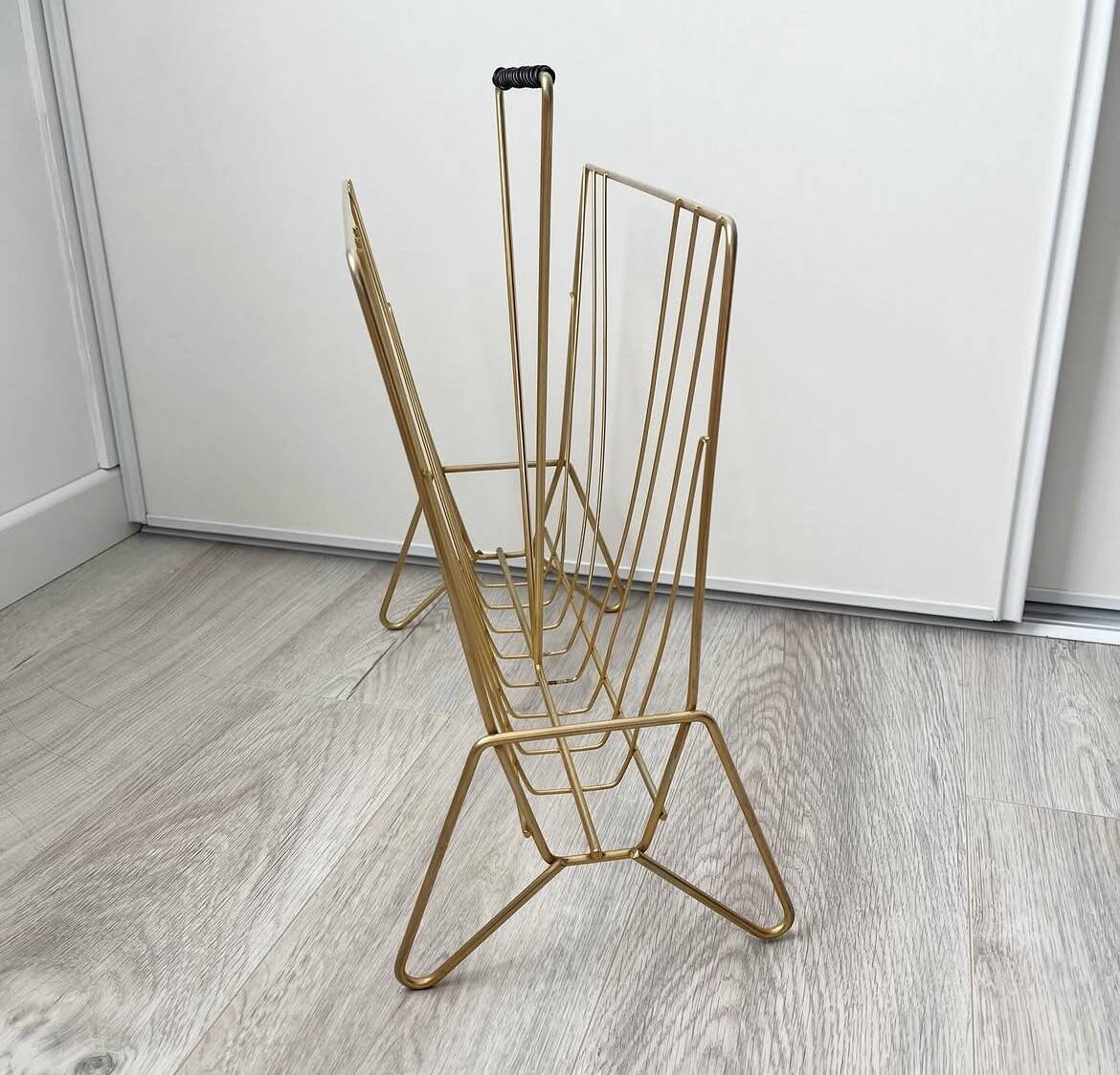 Vintage gold metal magazine rack
