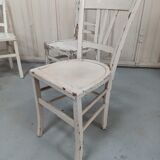 4 patinated white bistro chairs
