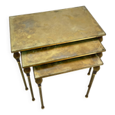 Nested brass tables, attributed to Maison Baguès, France, 1950–60.