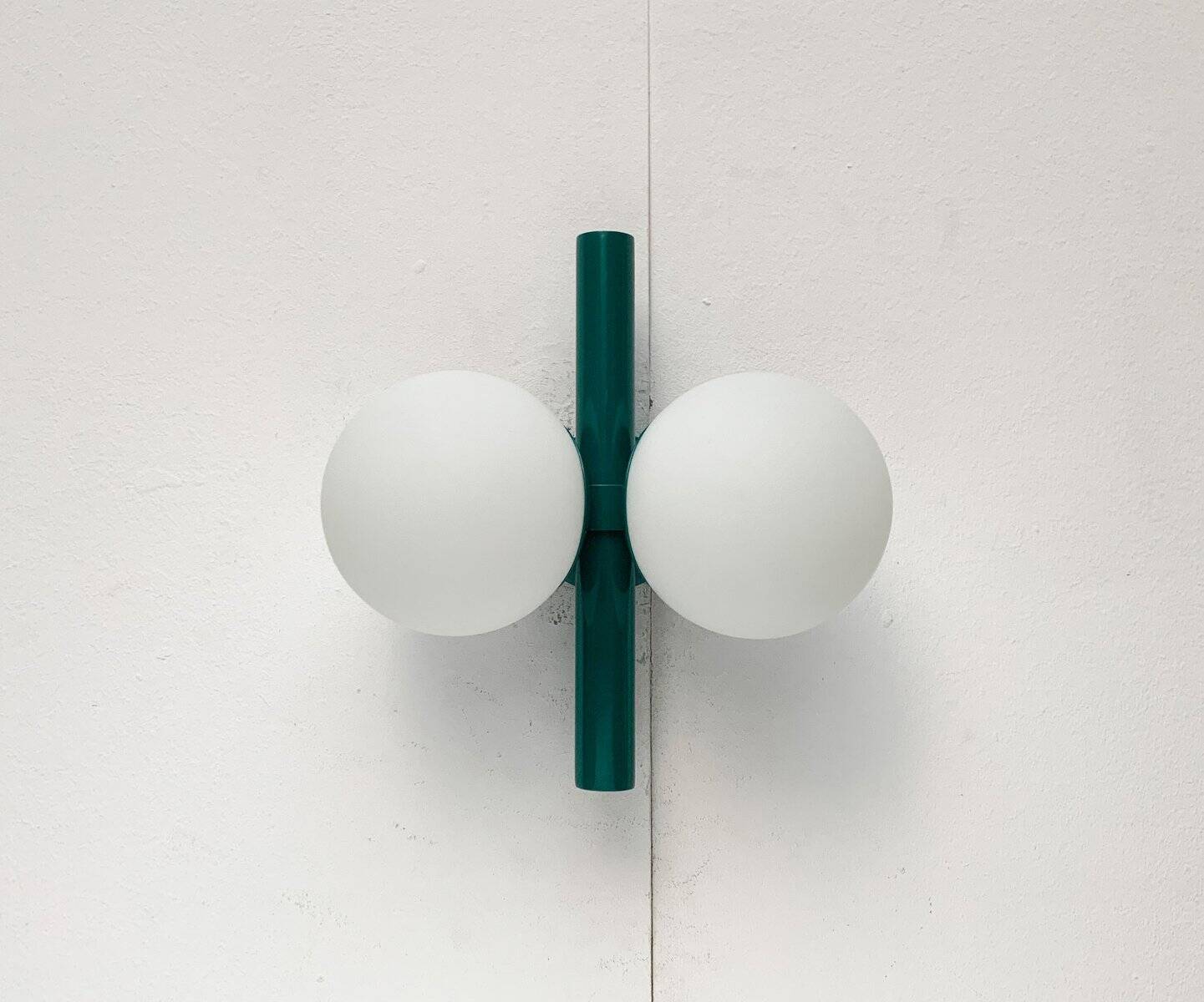 Mid-century German space age wall lamp by Kaiser Idell / Kaiser Leuchten.