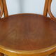 Old curved wooden armchair, 1930/1950. 78x58x48 cm.