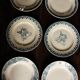 6 mismatched flat plates Terre de fer bleu Alésia Marcel Longchamp