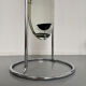 Large freestanding chrome metal full-length mirror in 1970s design.