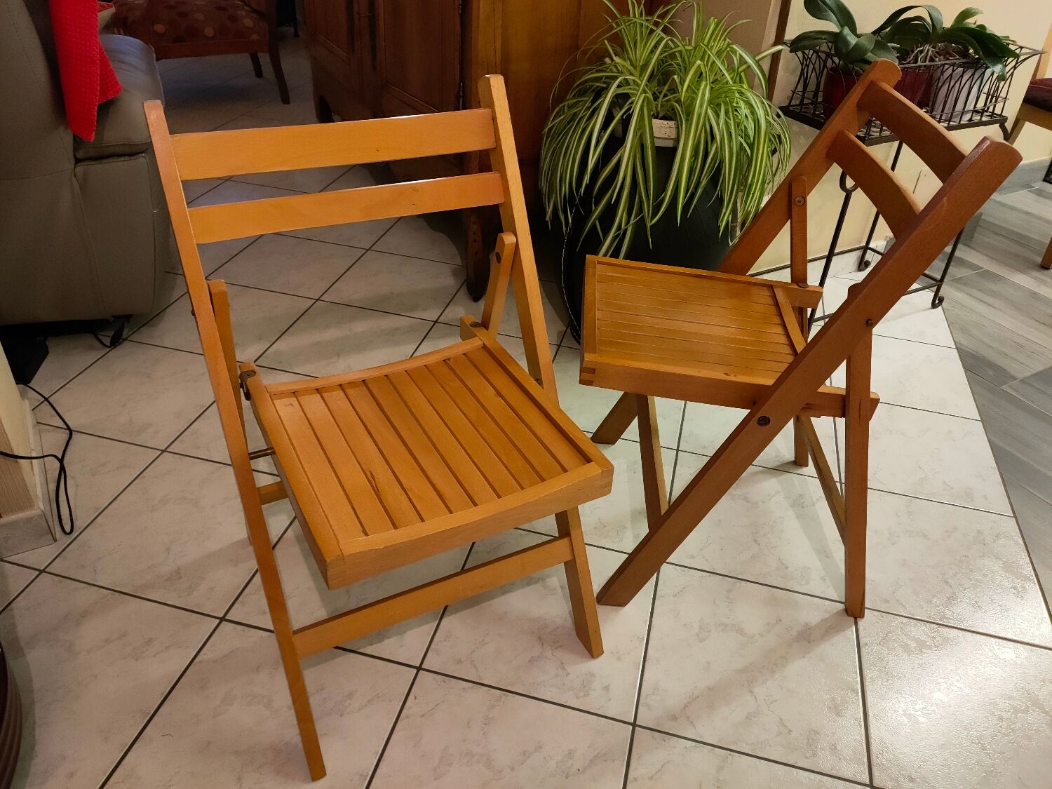 Pair of vintage folding wooden chairs