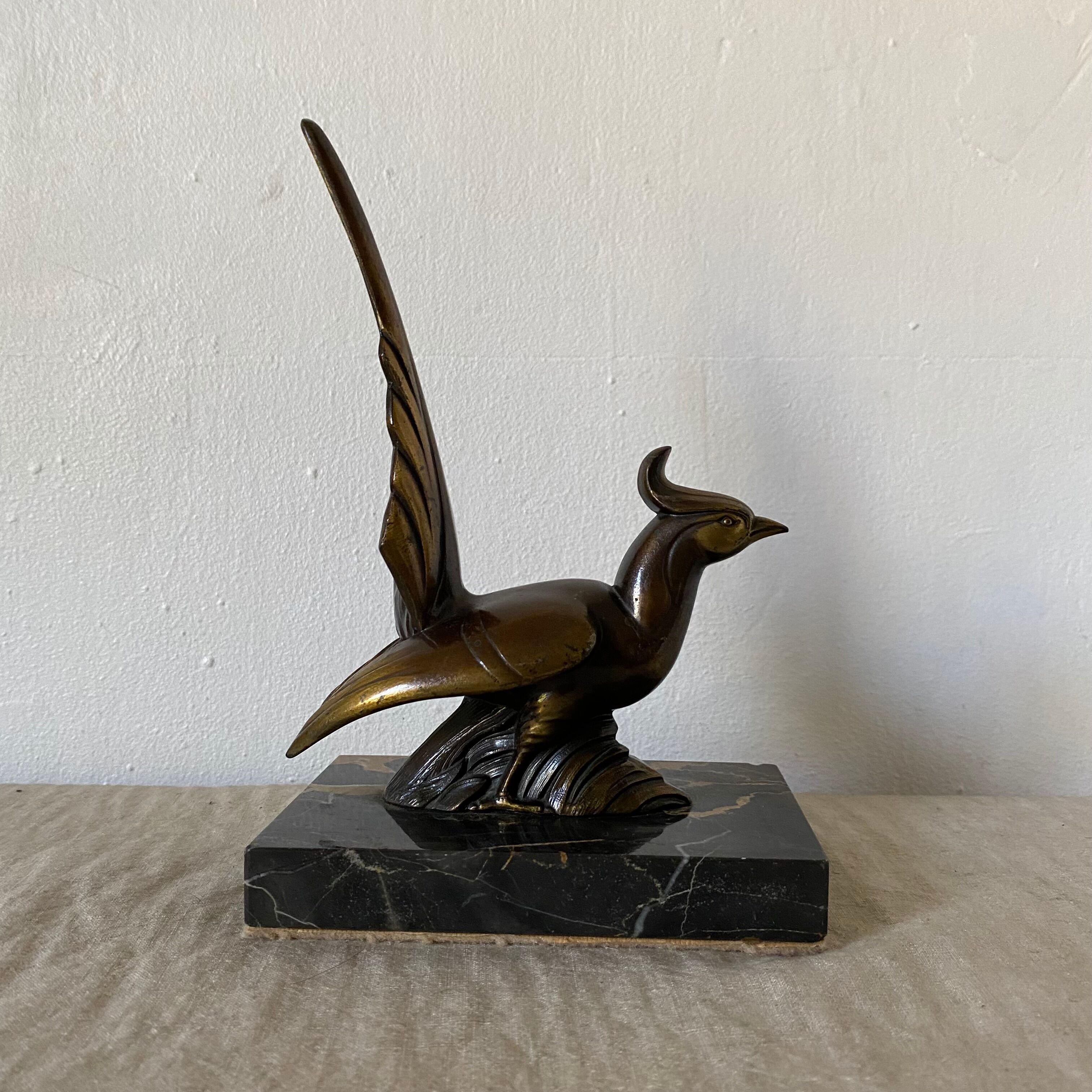 Greenhouse books bird marble