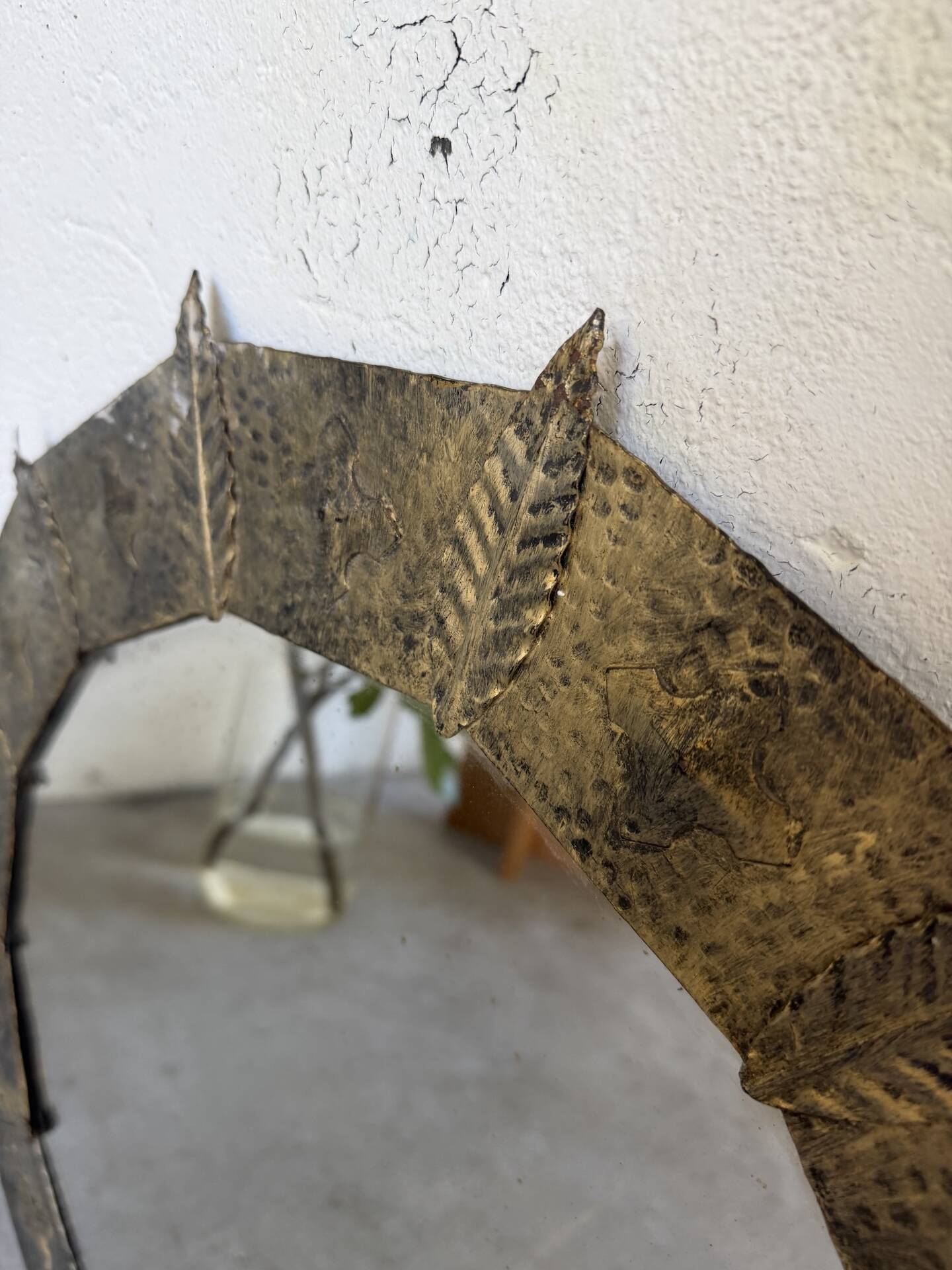 Brutalist round hammered gold metal mirror