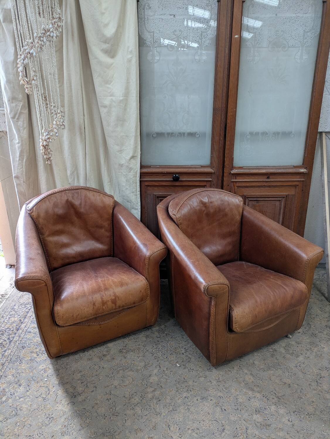Pair of leather armchairs