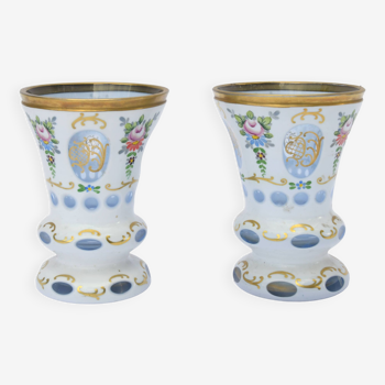 Pair of overlay glass vases with polychrome decoration of flower throws