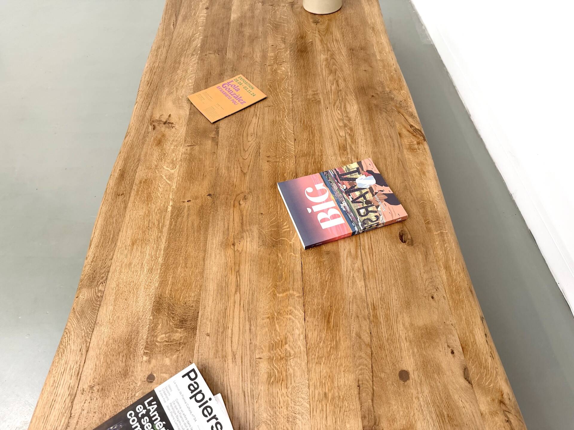 XXL oval coffee table in solid oak, cylindrical base, 1950s.