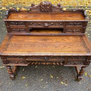 19th-century Renaissance carved oak desk with chair