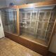 Set of 2 large vintage wooden and glass display cabinets – integrated lighting