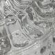 Molded glass ceiling light with spinning top relief
