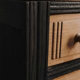 Commode noire et bois naturel à 4 tioirs