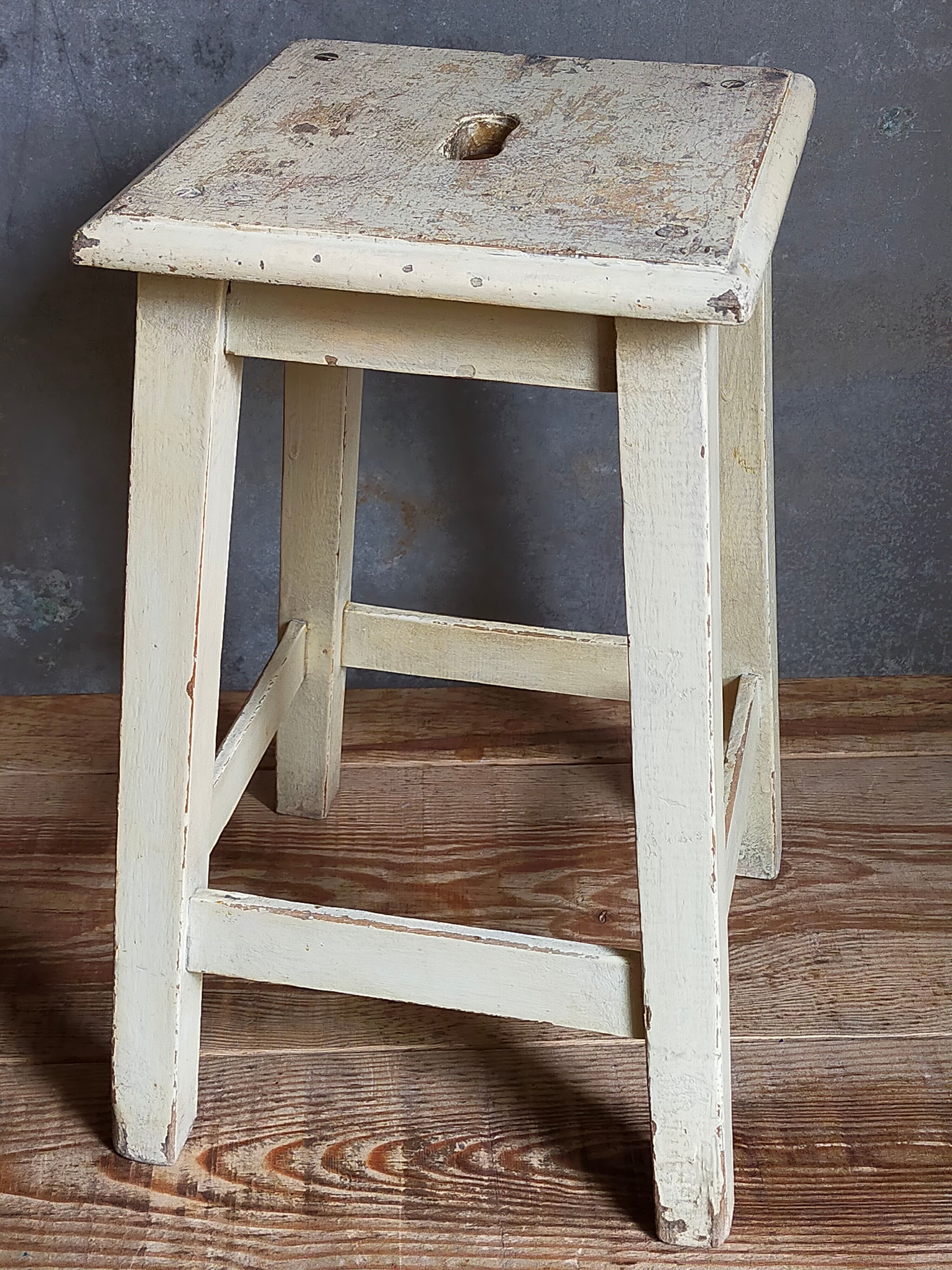 Wooden workshop stool with old patina