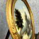 fixed under glass has oval view louis era Philip around 1830 animated lakescape