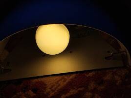 a pair of Ikea Kvintett wall lamps