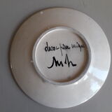Decorative plate with geometric decoration