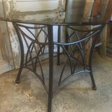 Table ronde pieds métal et verre fumée