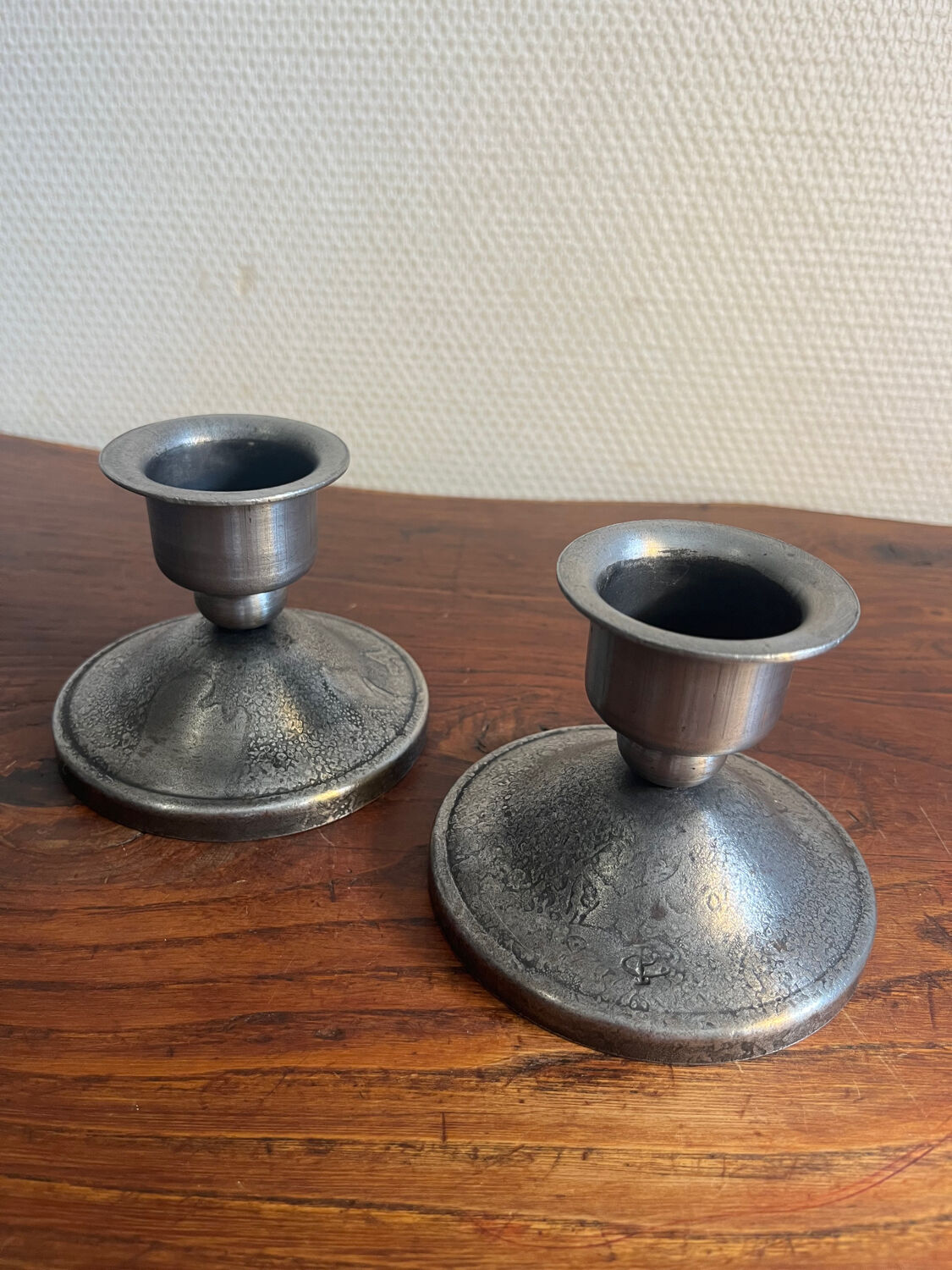 2 Charles Piguet wrought iron candlesticks