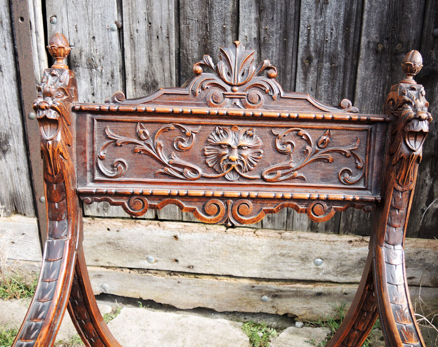 Former curulle chair says dagobert carved wood