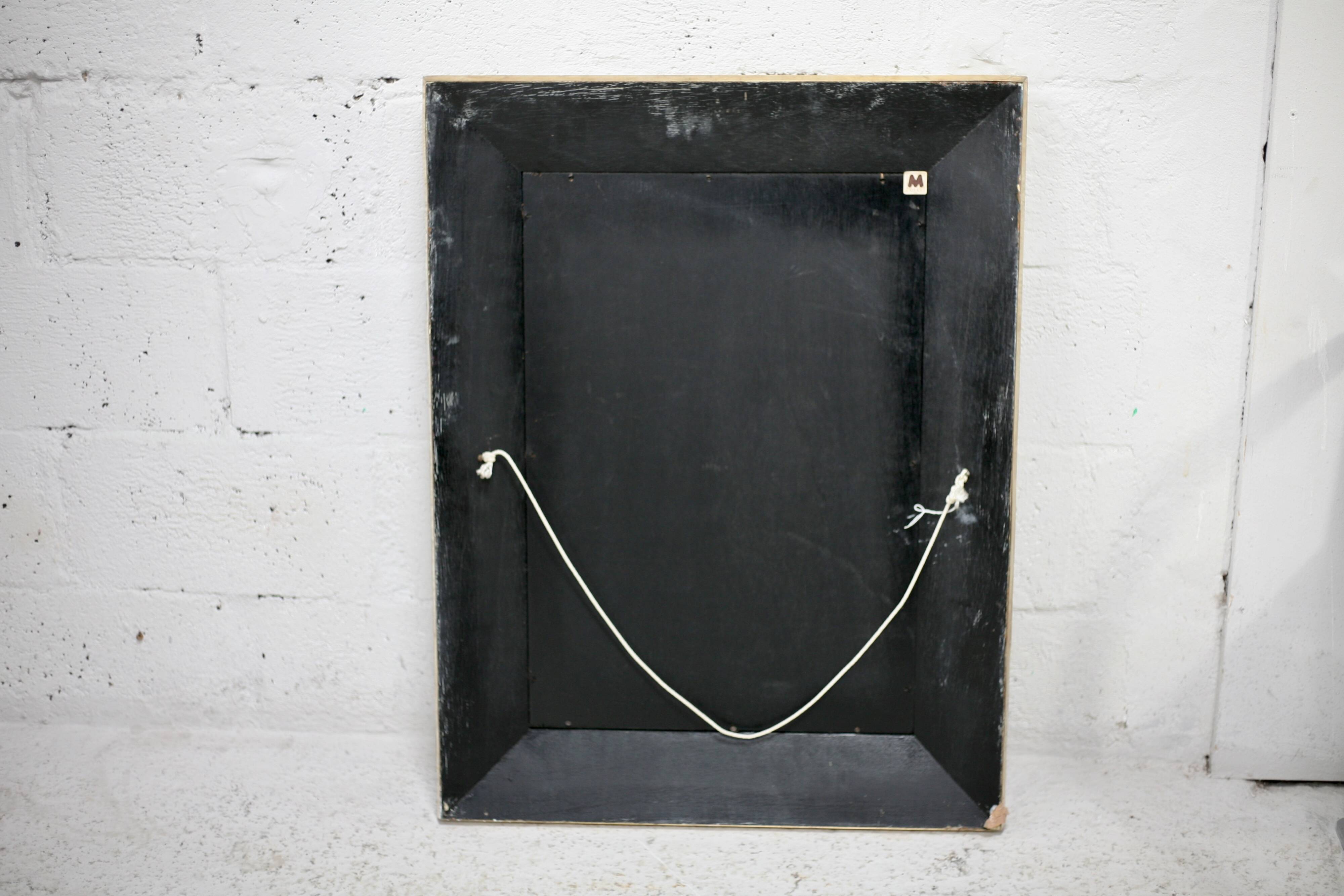 Jean-Claude Mahey mirror. Black lacquered wood and gold metal. 1970