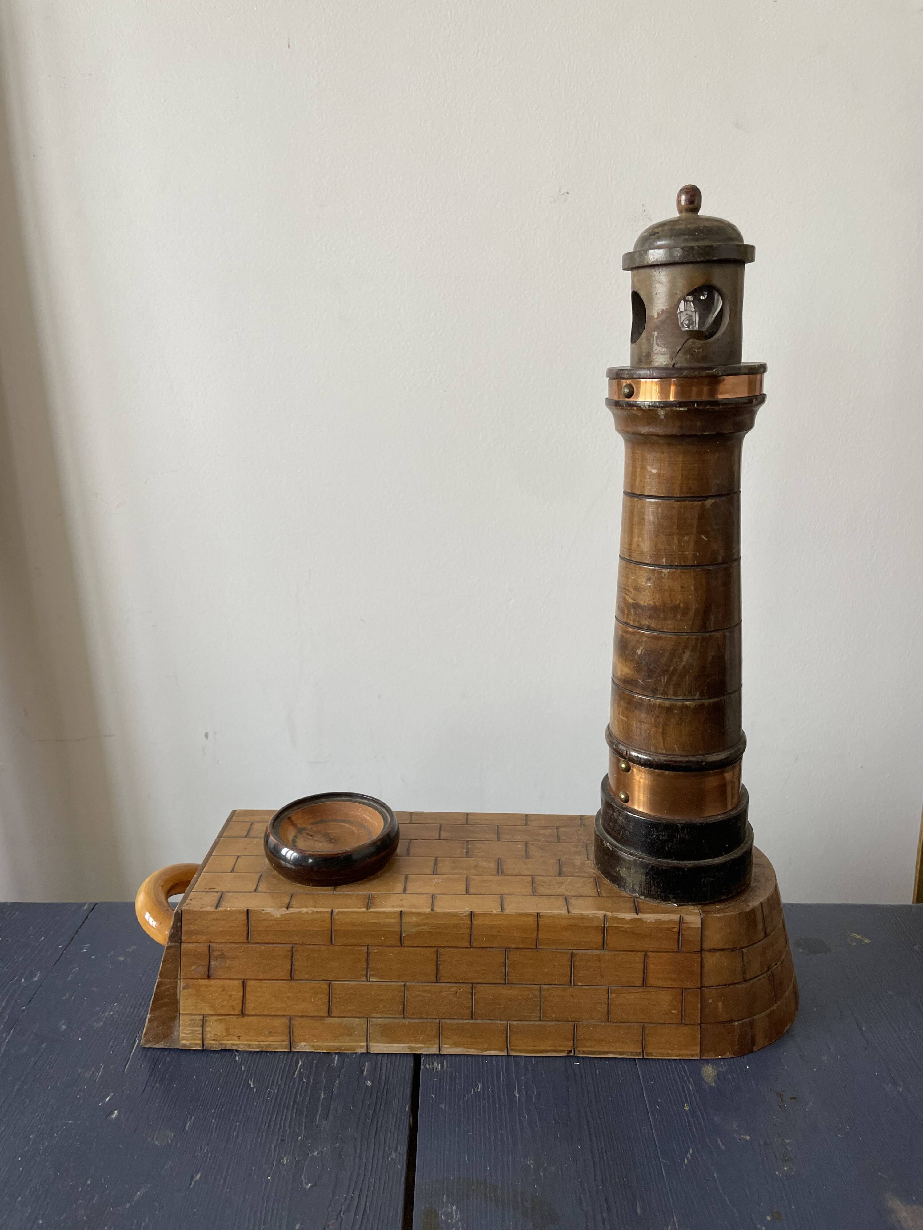Souvenir lighthouse lamp from Calais in wood