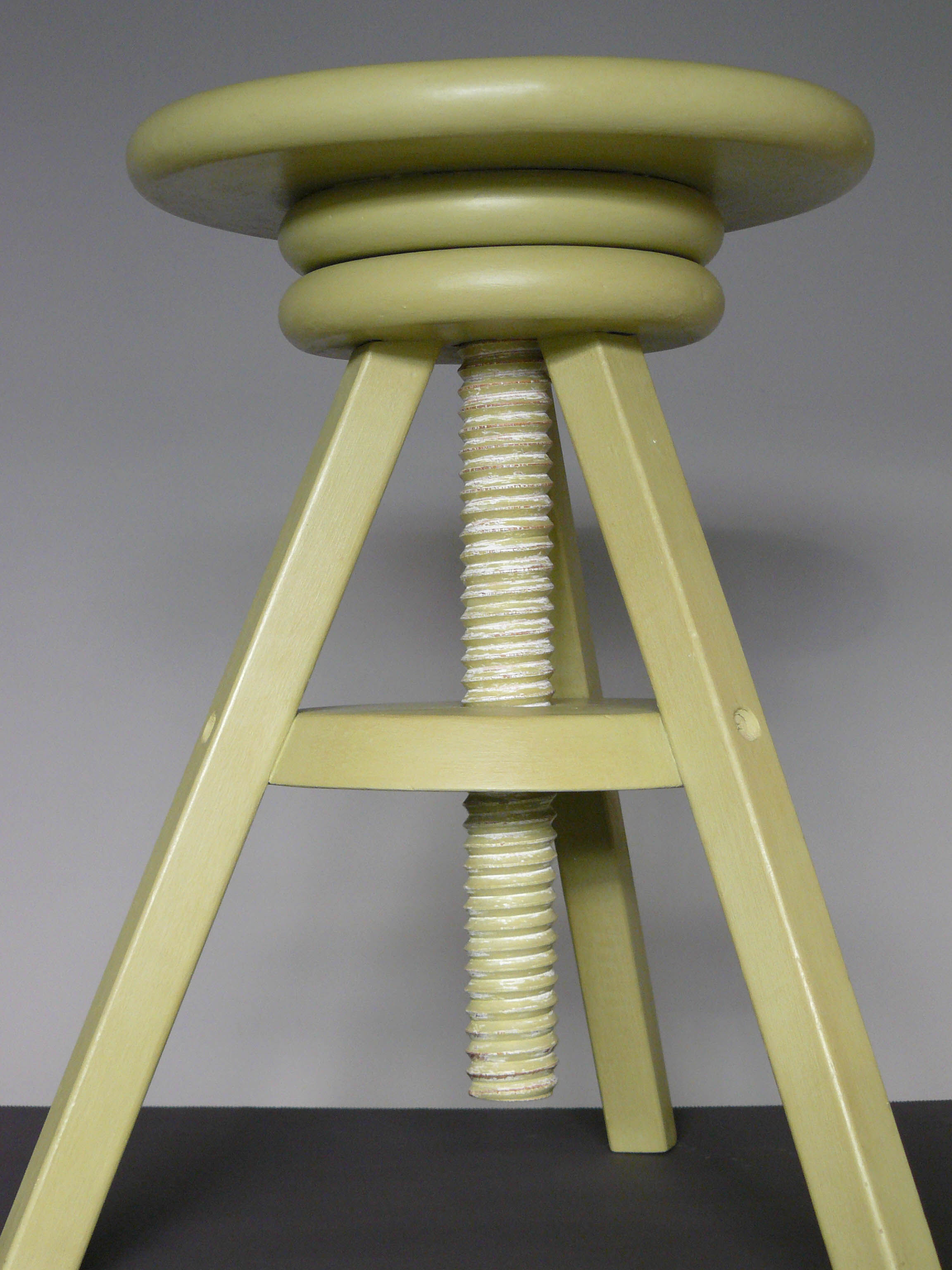 Painted and waxed wooden screw stool