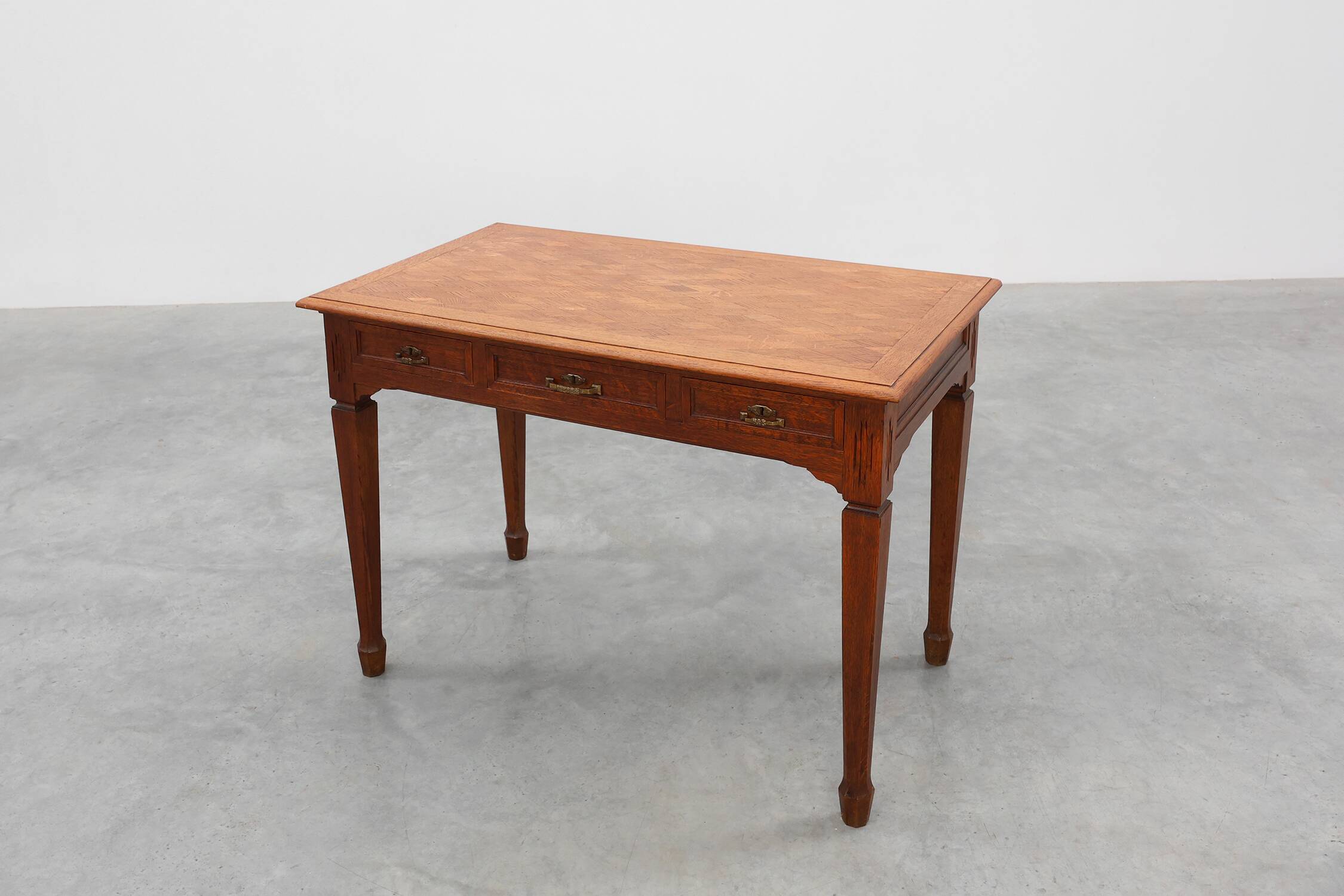 Art Deco carved oak Desk or Table with copper details, Belgium 1920s