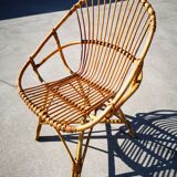 Four rattan chairs