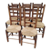 8 vintage straw chairs in the style of Charlotte Perriand.