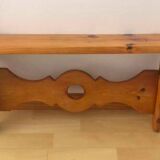 Rustic honey-colored varnished pine shelf