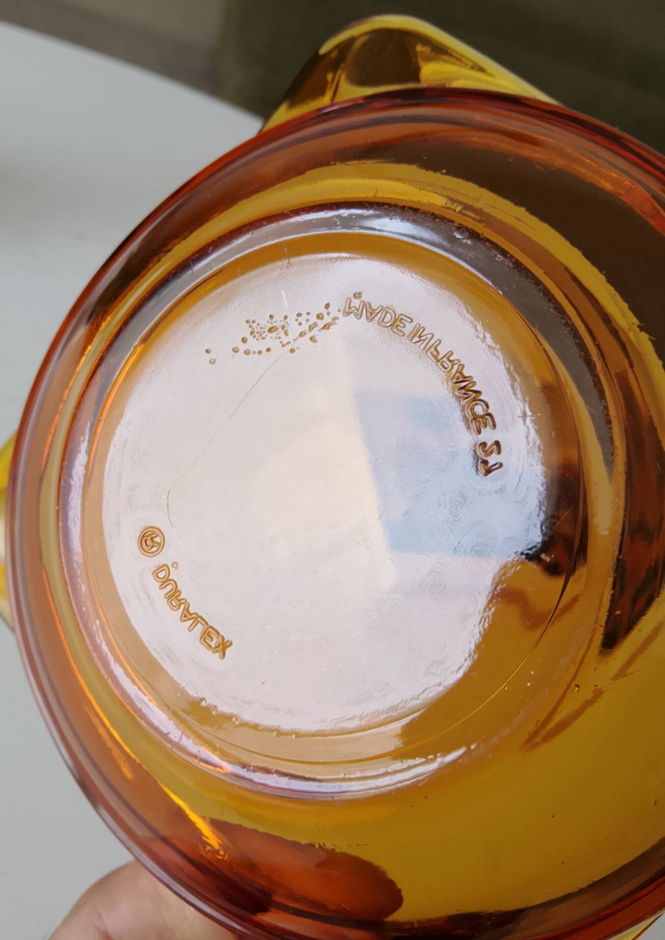 Vintage amber Duralex ashtray from the 1970s.