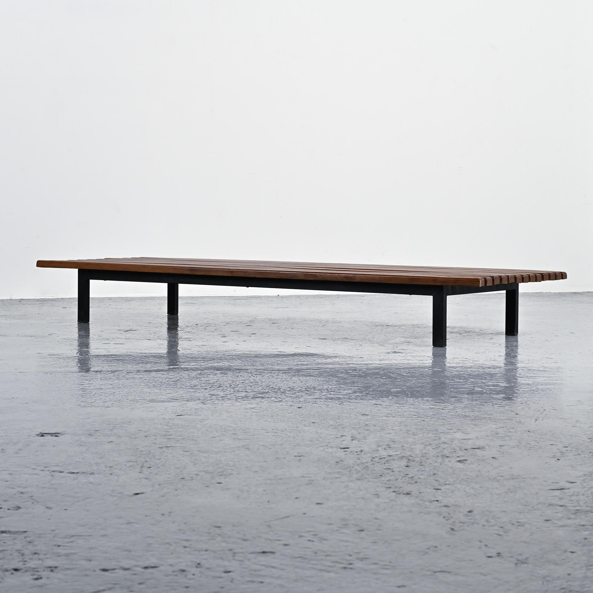 Cansado bench in mahogany by Charlotte Perriand, circa 1962.