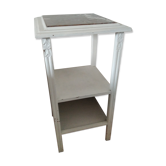 White night table with red marble top