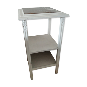 White night table with red marble top
