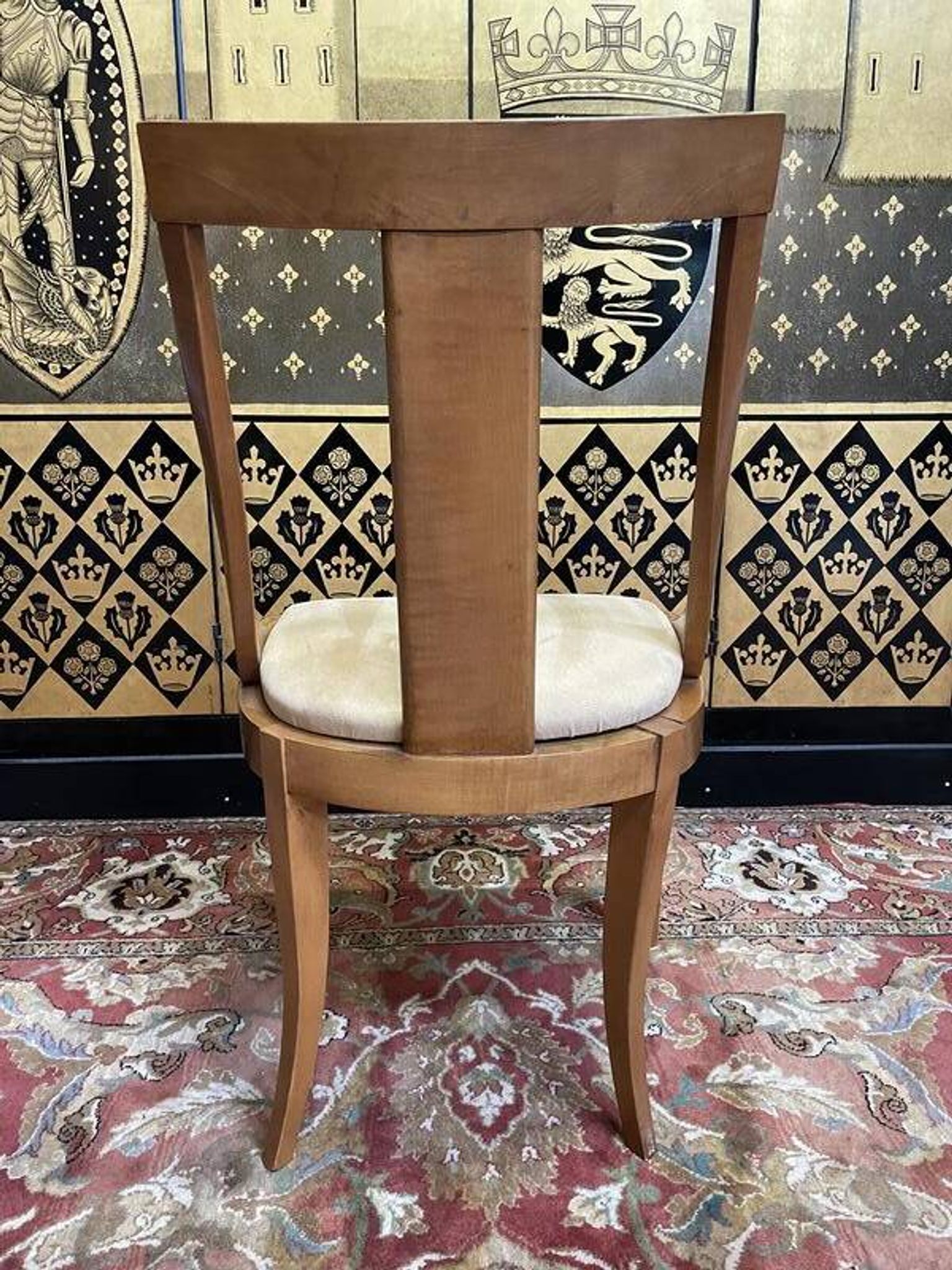 Suite de 6 chaises gondoles de style Empire