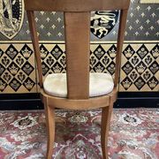 Suite de 6 chaises gondoles de style Empire