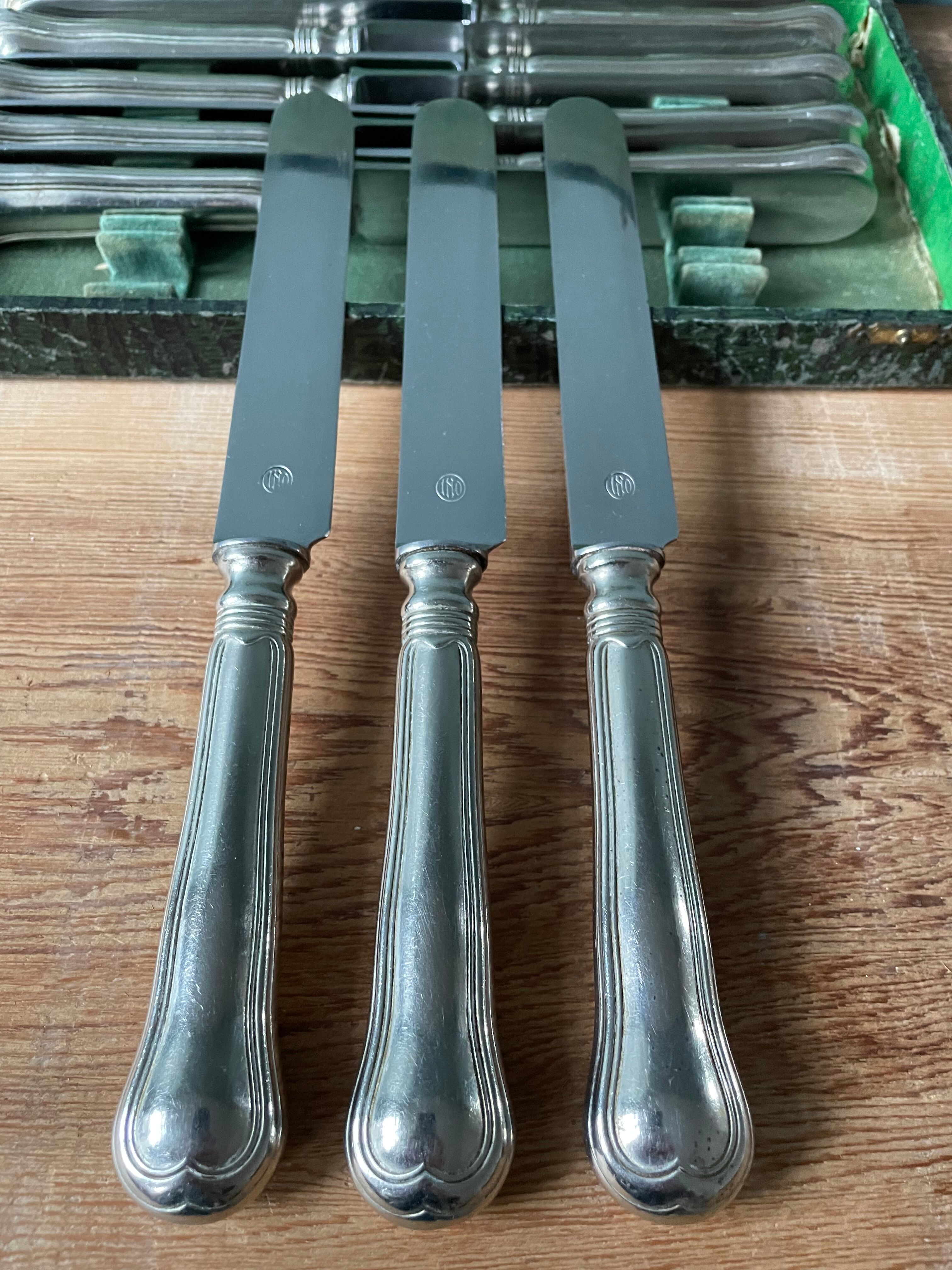 12 antique Ercuis table knives in silver metal